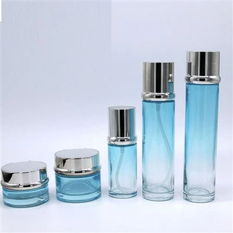 उच्च गुणवत्ता वाले कस्टम के साथ स्वयं का ब्रांड स्काई ब्लू ग्रेडिएंट पुश डाउन एसेंस बोतल क्रीम बोतल